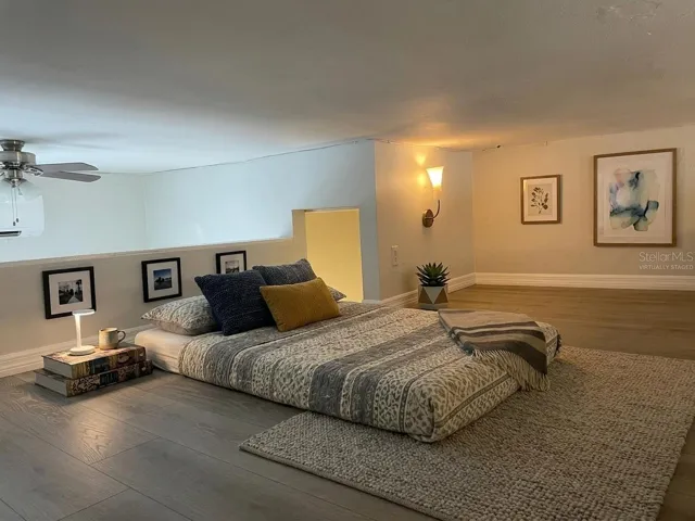 short ceiling loft space- virtually staged