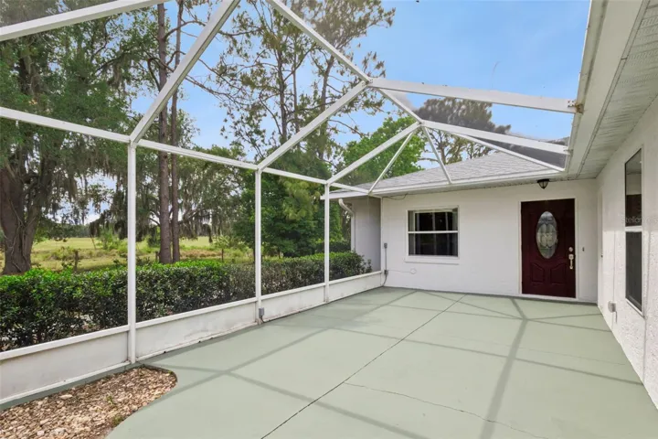 Large screened patio with views of the pastures surrounding this corner unit