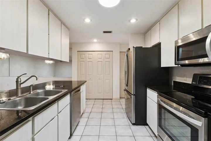 Functional kitchen with ample cabinetry and prep space