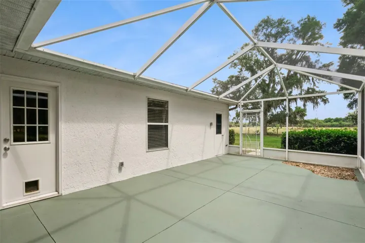 Large screened patio with views of the pastures surrounding this corner unit