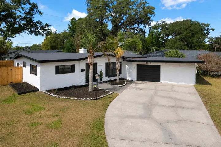 Fully Renovated Exterior with Extended Driveway & Modern Curb Appeal