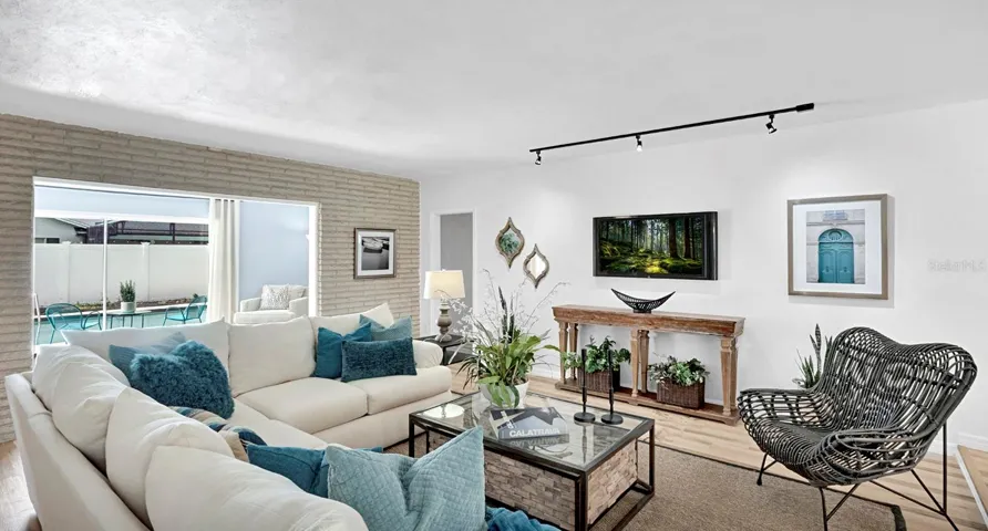 Bright Open-Concept Living Room with Designer Finishes