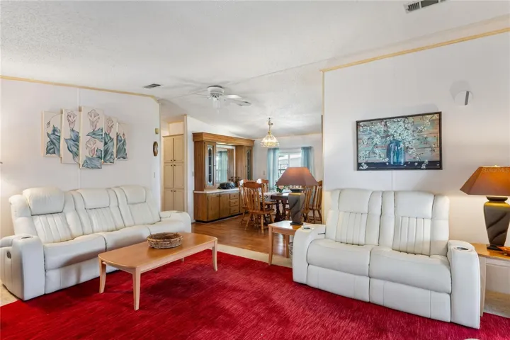 LIVING ROOM/ DININGROOM, CEILING FAN/LIGHT, NICE RECLINER COUCHES
