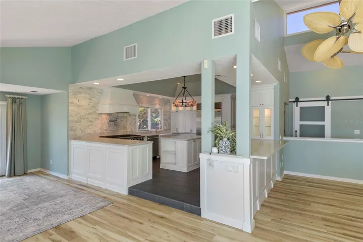 Kitchen designed for entertaining with custom buffet bar facing the dining area