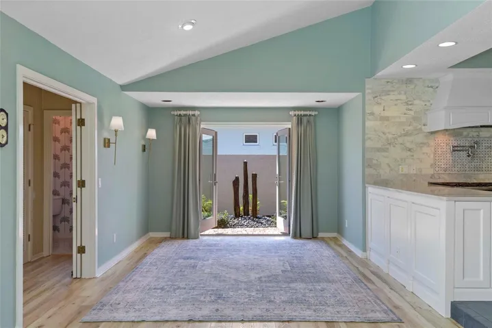Dining Area Opens to Kitchen and Private Courtyard