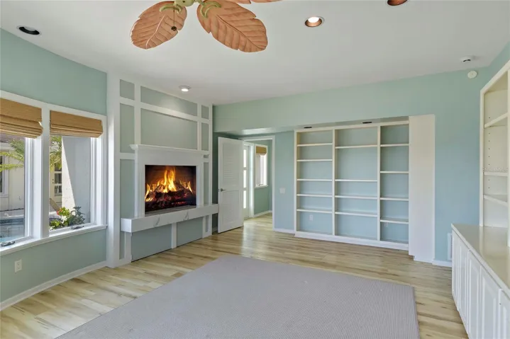 Library/Office with natural gas fireplace. Also perfect to convert to a ground floor Primary Suite.
