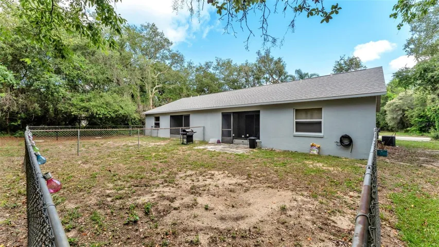 fenced back yard