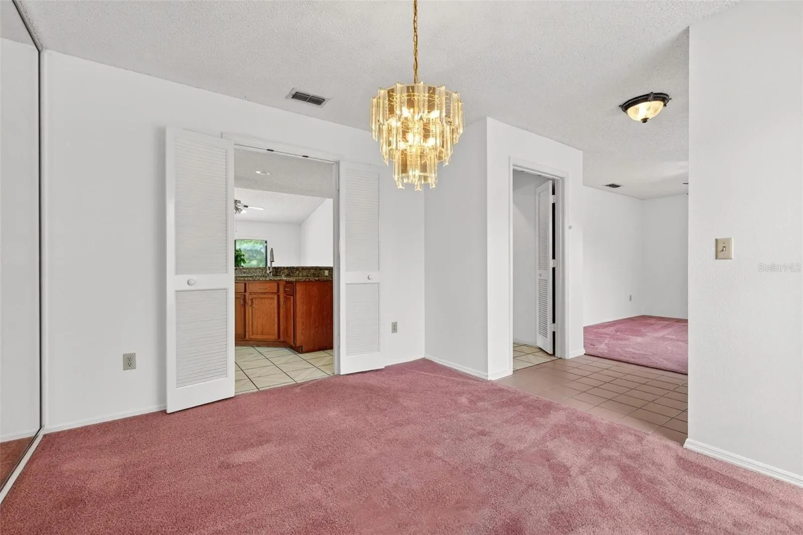 Dining Room Looking towards Kitchen and Foyer