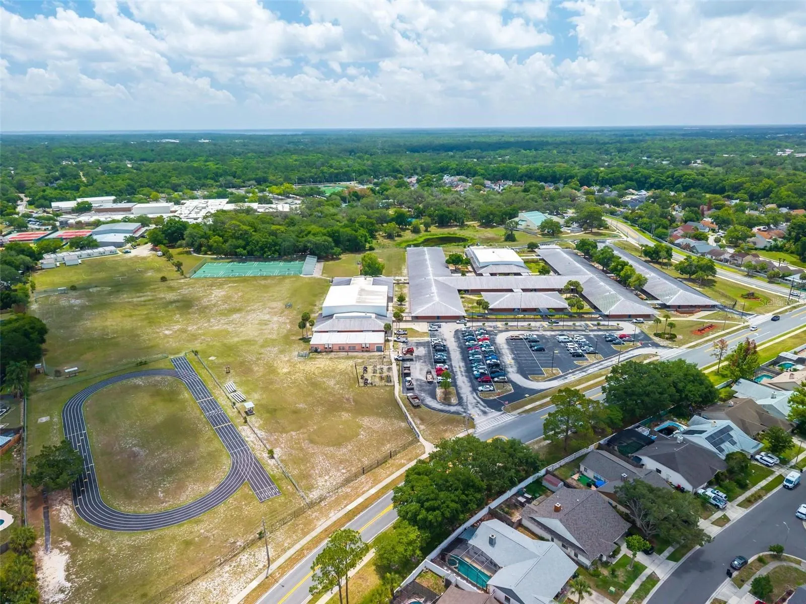 Aerial View of Middle School in forefront and High School in background (both within a short walking or biking distance)
