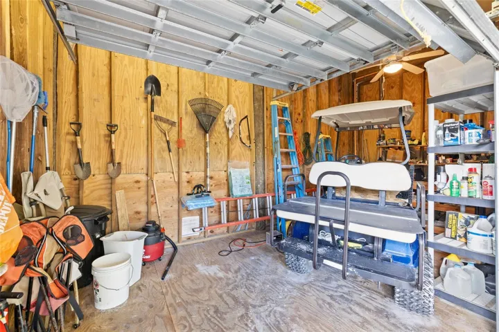 Garage, workshop, golf cart comes with the house