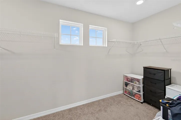 Primary bedroom walkin closet