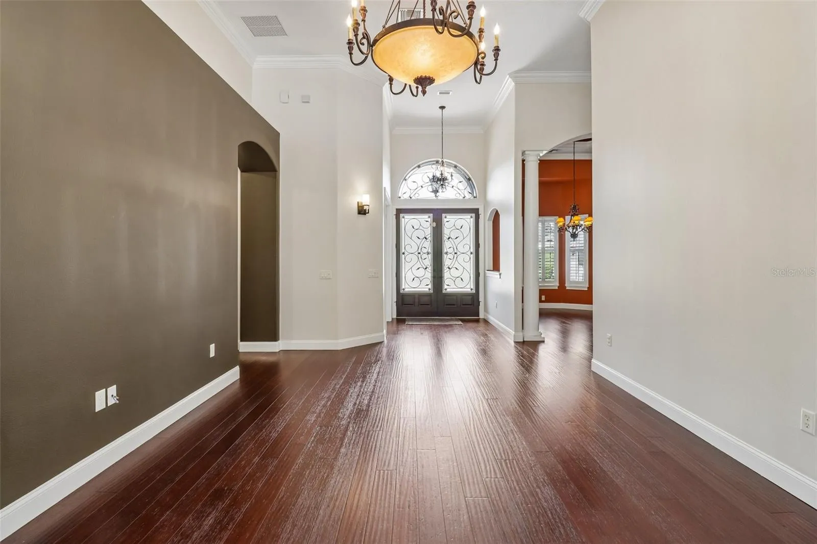 LIVING ROOM VIEW OF FRONT ENTRY