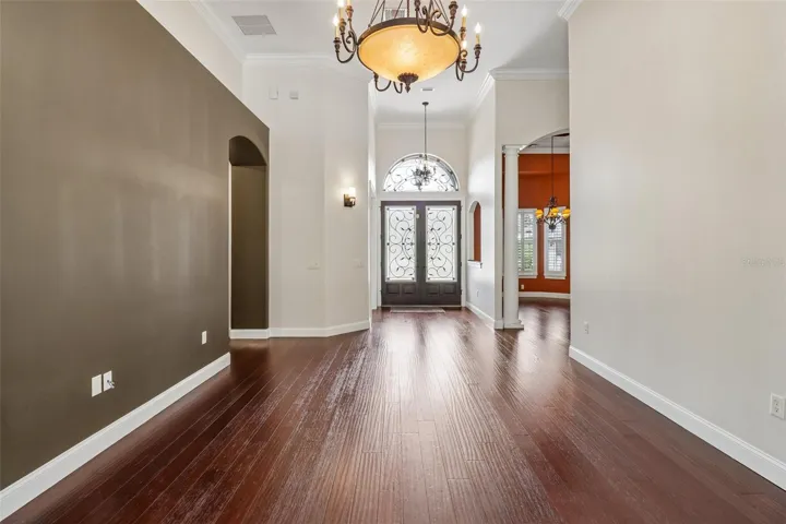 LIVING ROOM VIEW OF FRONT ENTRY