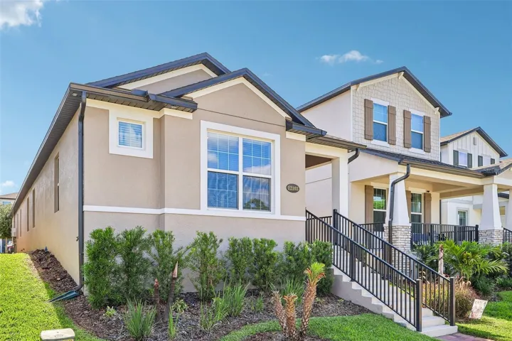 Welcome to this BEAUTIFULLY MAINTAINED 3-bedroom, 2-bath home in the highly desirable Encore at Ovation community in Winter Garden, where modern style, energy efficiency, and LOW-MAINTENANCE LIVING come together perfectly.