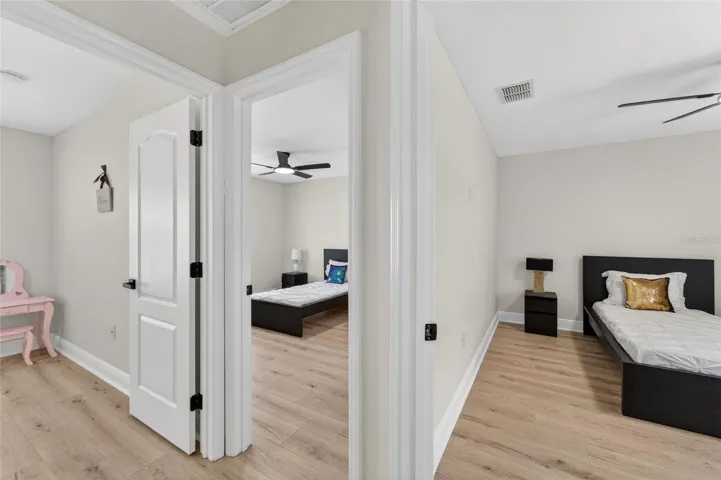 There are 3 guest bedrooms on this side of home with a full pool bath
