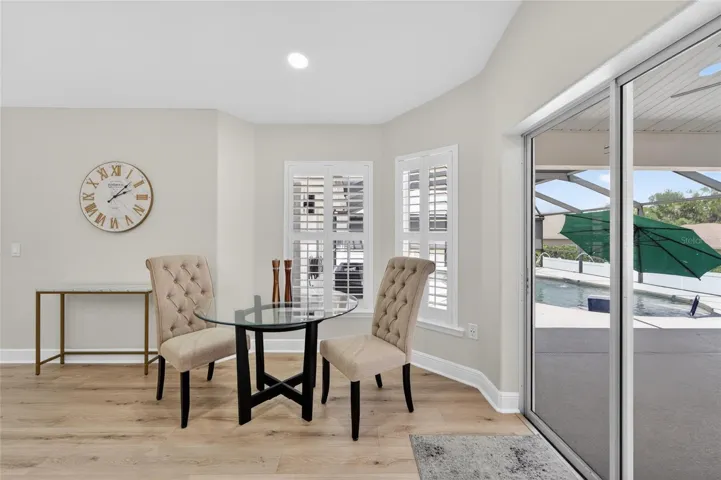 eat in kitchen area and sliders to pool