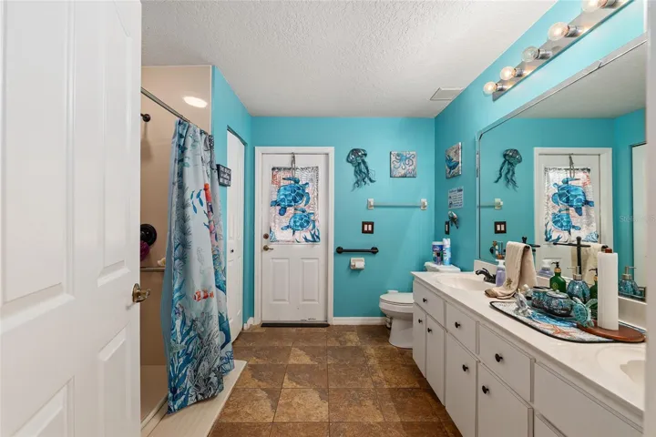 Guest Bathrooom with door to pool