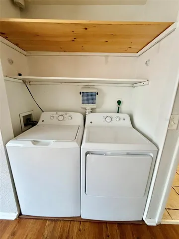Full size washer and dryer inside unit.