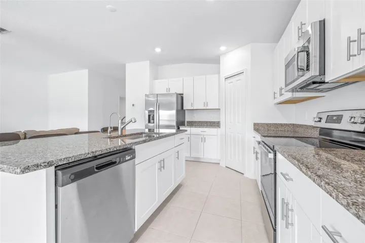 Kitchen 13x16 All Stainless Steel Appliances