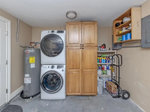 New washer and dryer and built in cabinetry in the garage