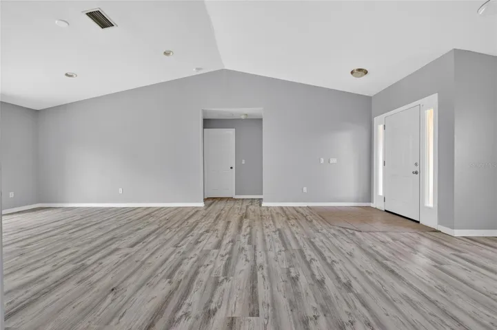 Living area and hallway to guest rooms.