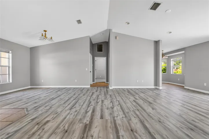 Living area and hallway to Master bedroom, Kitchen and Laundry Room.