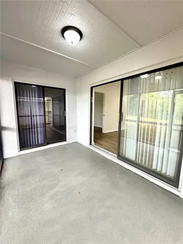 Back Porch access off the living room and the master bedroom