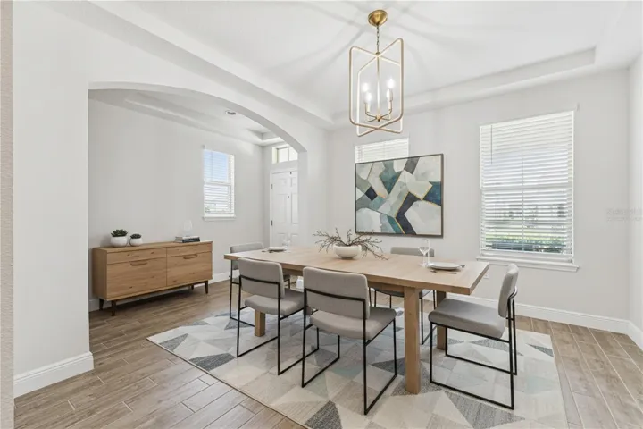 This picture was virtually staged - Dining room and Foyer
