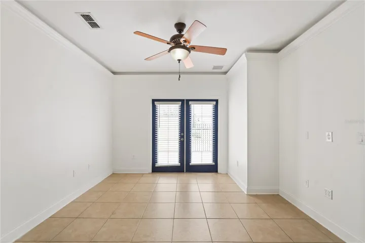 Huge main bedroom on first floor with patio entrance.