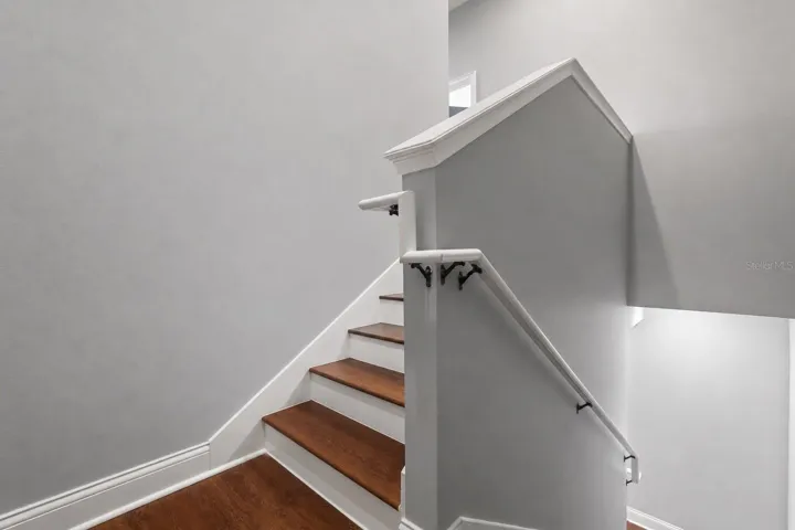 Winding stairs to second floor.