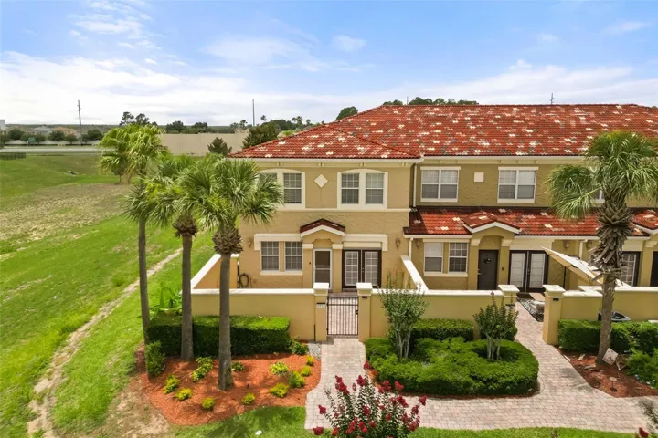 Corner unit townhome with gated in patio.