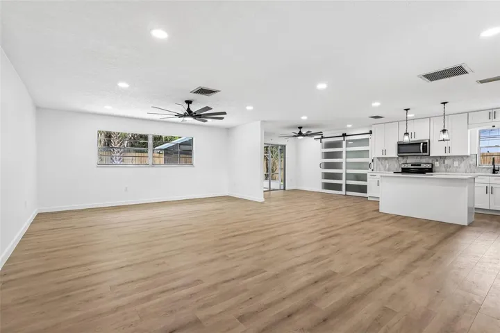 Open concept living, dining, kitchen.