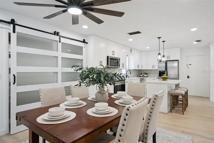 Brand new modern kitchen is open to the living and dining spaces.