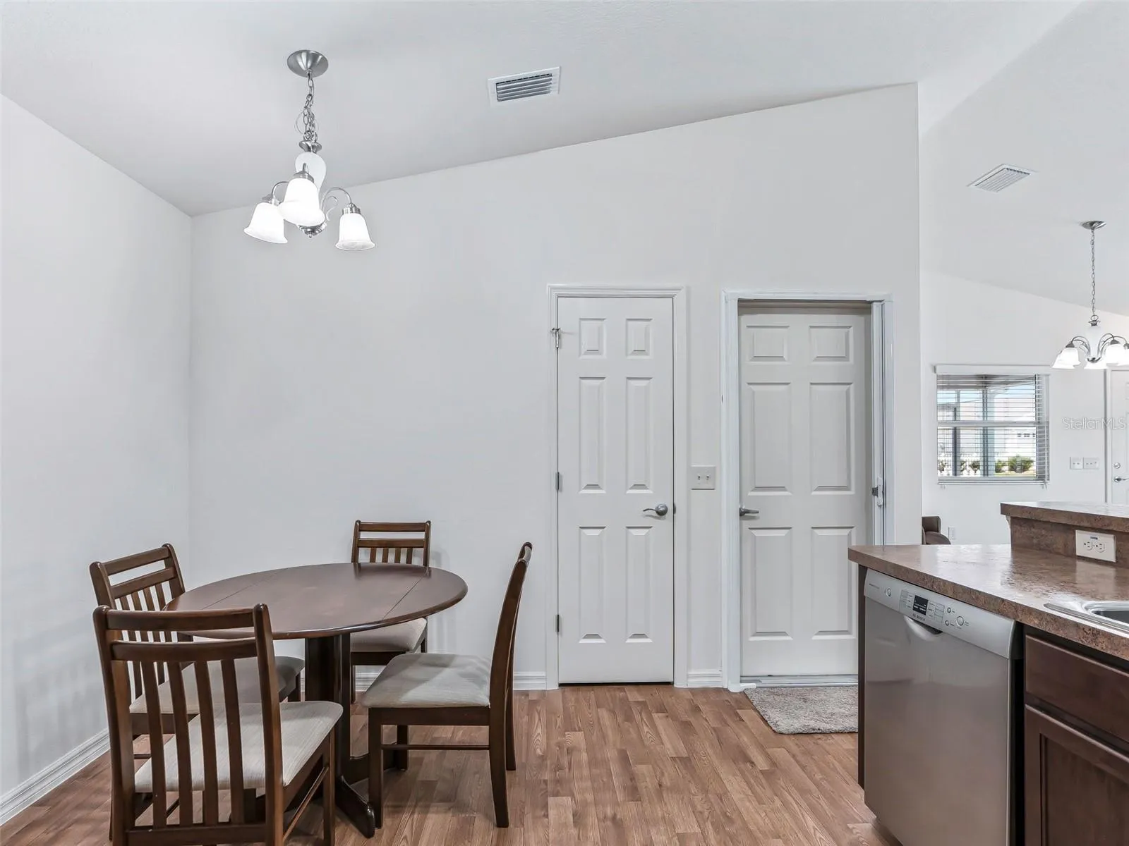 Kitchen opens to living area