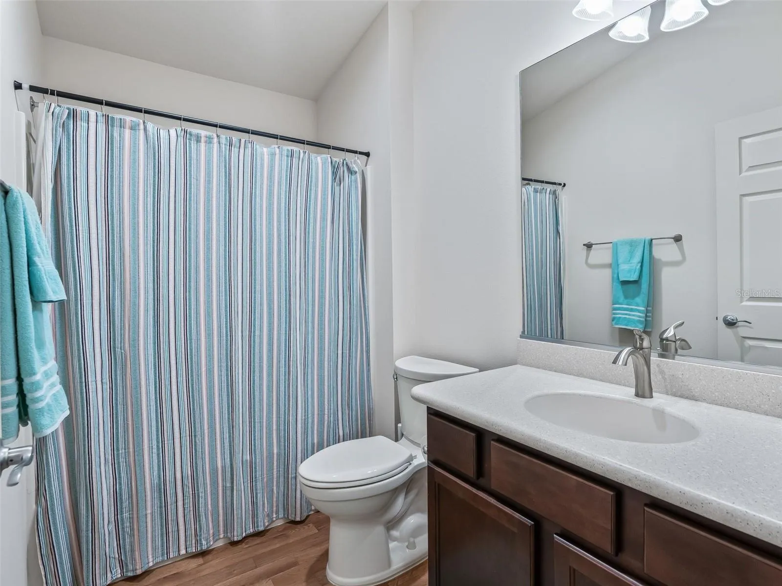 Guest bathroom w/Corian Topped Vanity