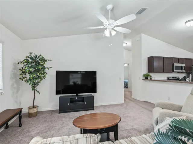 Living area w/Vaulted ceiling