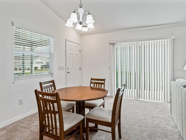 Dining area w/Upgraded light fixture