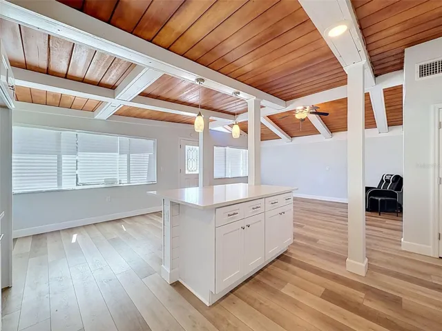 Open-concept kitchen designed for entertaining with generous prep space and seating area.