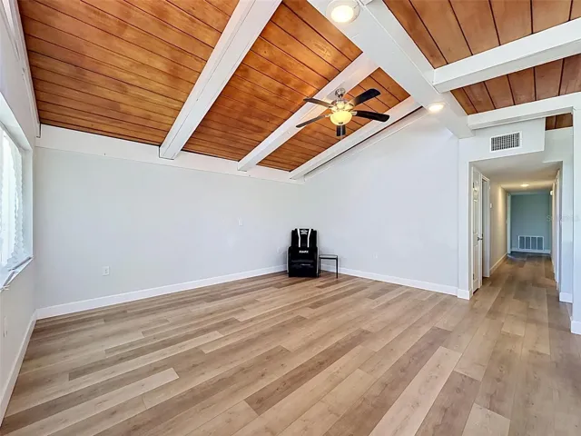 Bright and airy main living area with dramatic ceiling lines and modern coastal finishes.