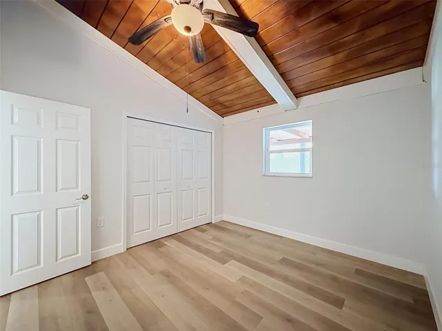 Spacious bedroom with room to comfortably accommodate a queen-size bed and additional furnishings.
