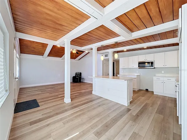 “Kitchen overlooks the main living area, creating an ideal space for hosting family and friends.”