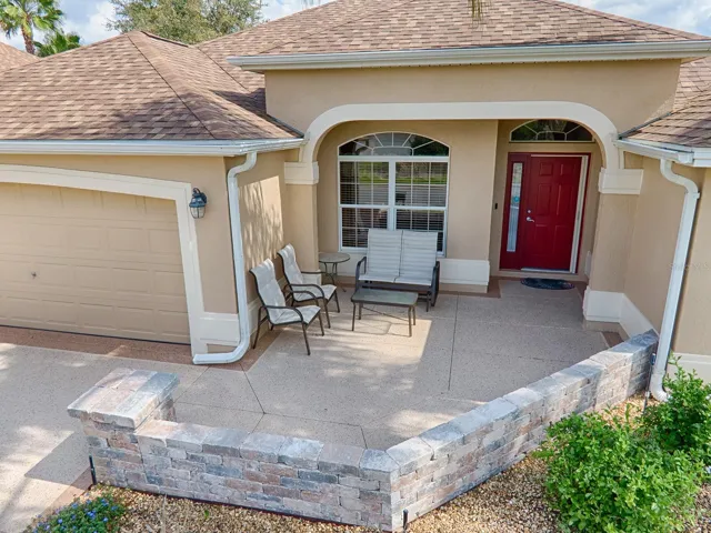 WHAT A BEAUTIFUL FRONT PATIO.