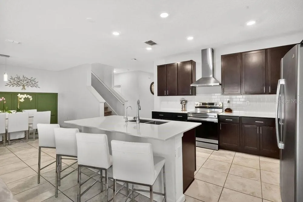 Kitchen, Island View and Dining Area.