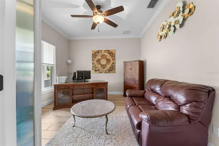 First-floor office/den off the foyer — ideal for work-from-home or a private study.