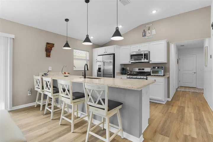High End Quartz added on this large, beautiful Kitchen Island.