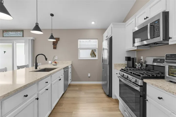 Plenty of Cabinets here along with upgraded Kitchen Sink and of course Gas cooking!