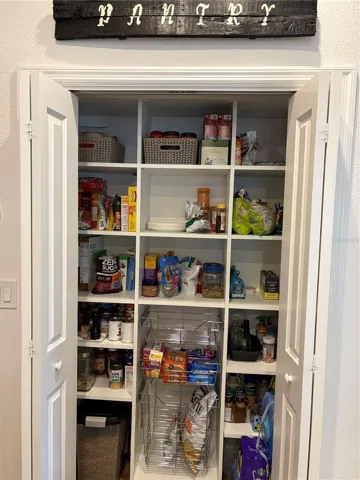 Pantry with Built-In shelving Tripling your space.