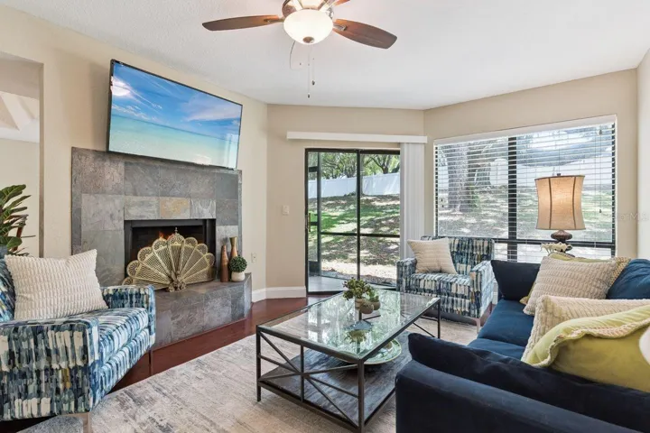 Living Room Features a wood burning Fireplace