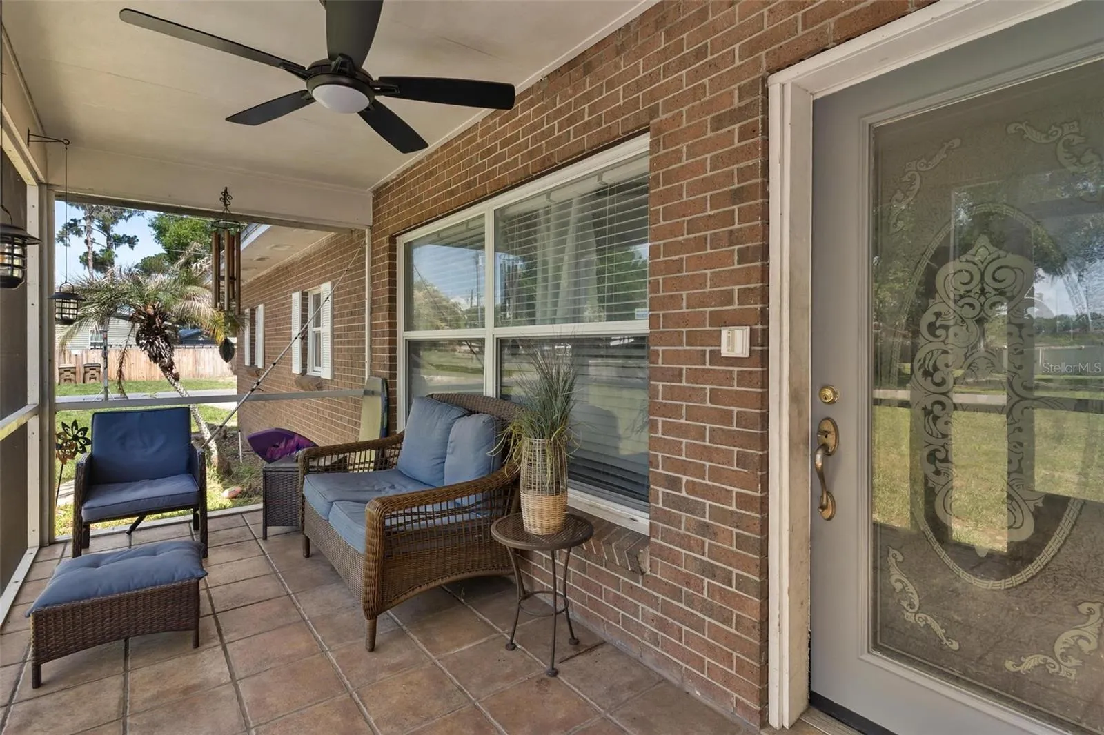 Screened front porch for relaxing or socializing