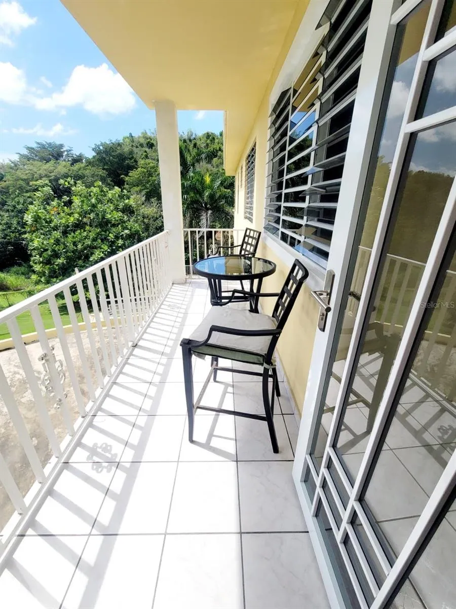 Hacienda del Dorado, Dorado, Puerto Rico property offering 4 bedrooms, 2.5 bathrooms, 2,500 sq. ft. of living space on a 3,947 sq. meter lot. Gated community with 24-hour security and excellent access to main roads in Dorado. Spacious layout with double carport for 4 vehicles and lower-level areas with plumbing and electrical ready for future conversion. Large lot provides privacy and expansion potential in a prime Dorado residential location.